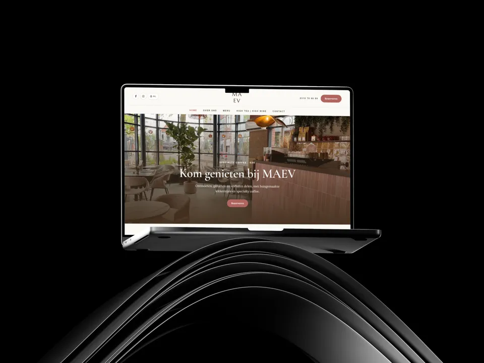 Café MAEV website on a laptop